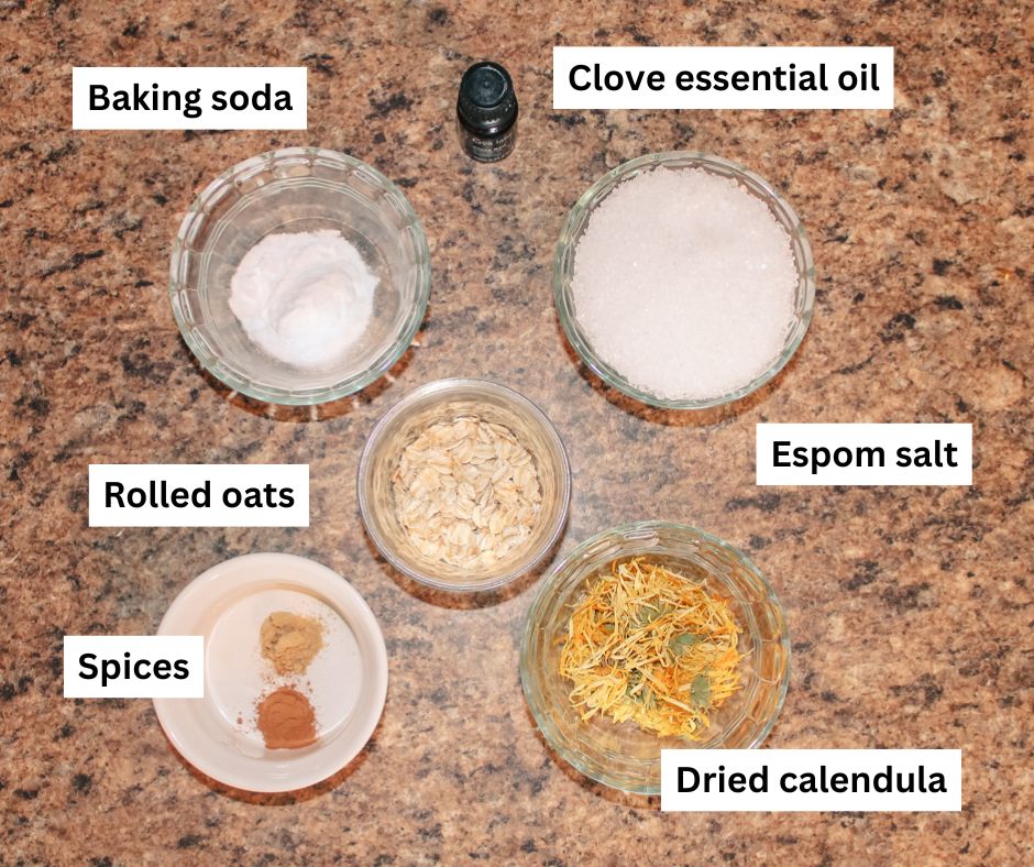 a variety of bowls filled with ingredients to make bathing salts
