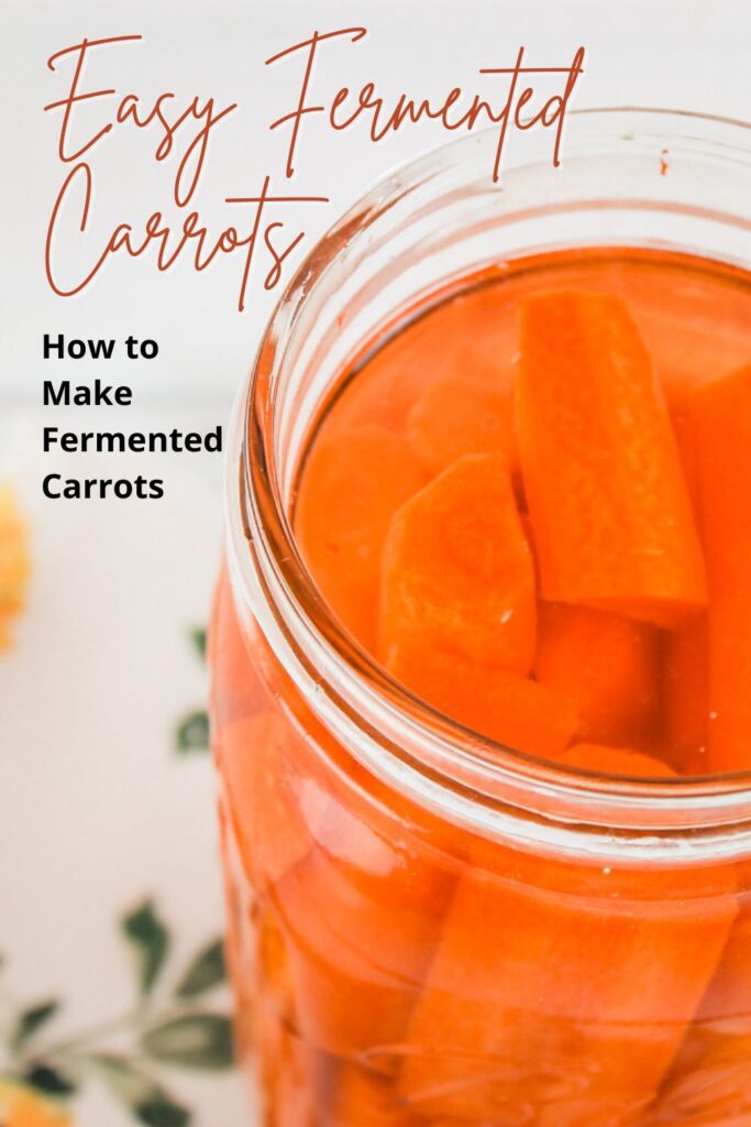 pinterest graphic displaying photograph of carrots in a jar fermenting