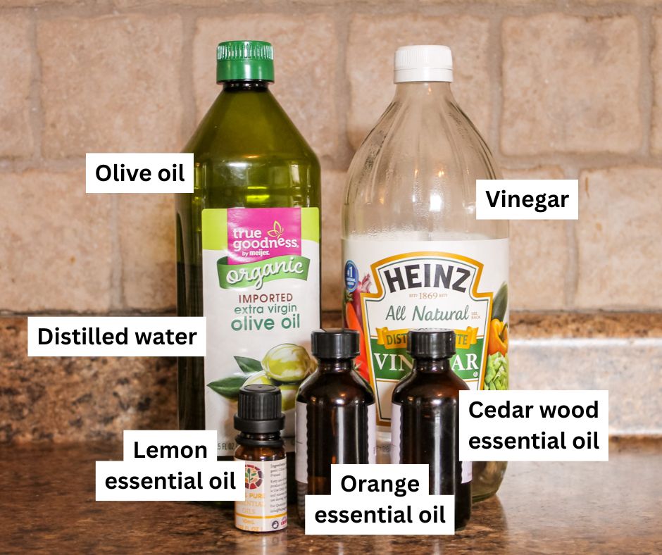 bottles of supplies to make diy dusting spray