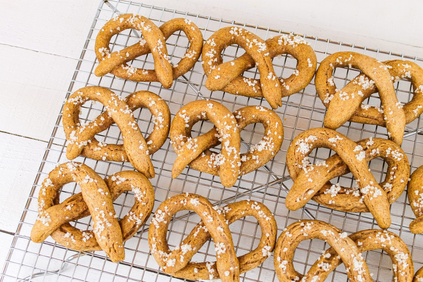 soft pretzels sitting on a cooling rack