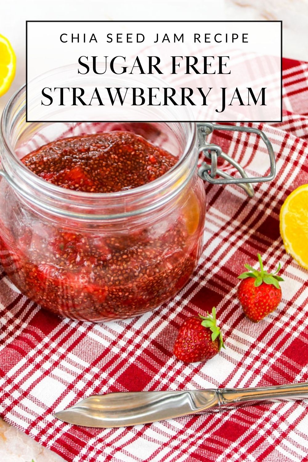 close up of a jar full of strawberry jam