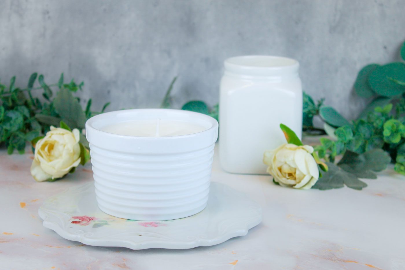 sox wax candle fills a striped white glass container