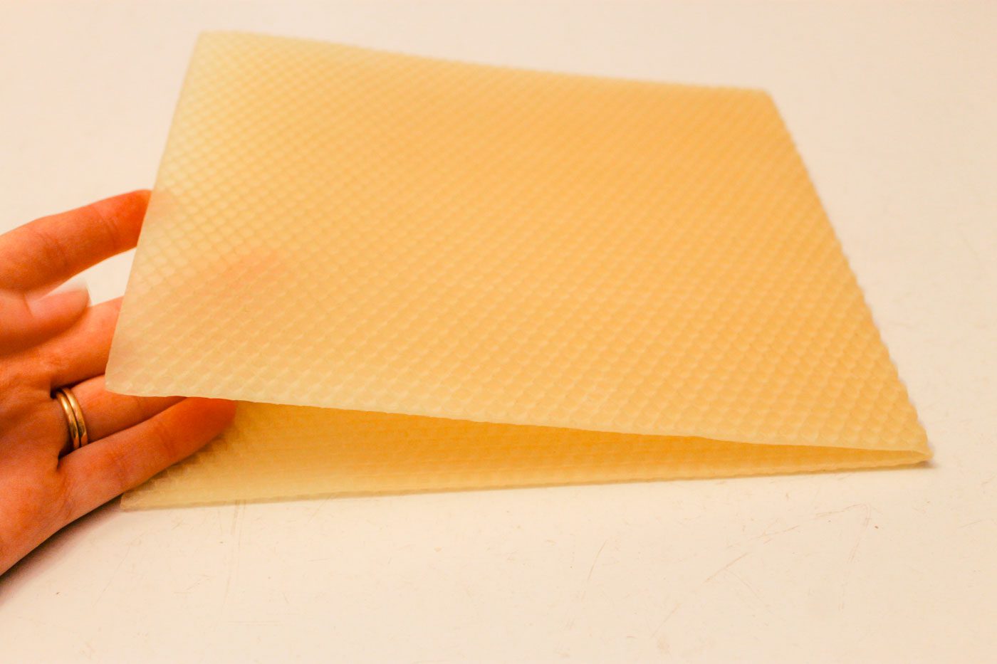 a stack of beeswax sheets
