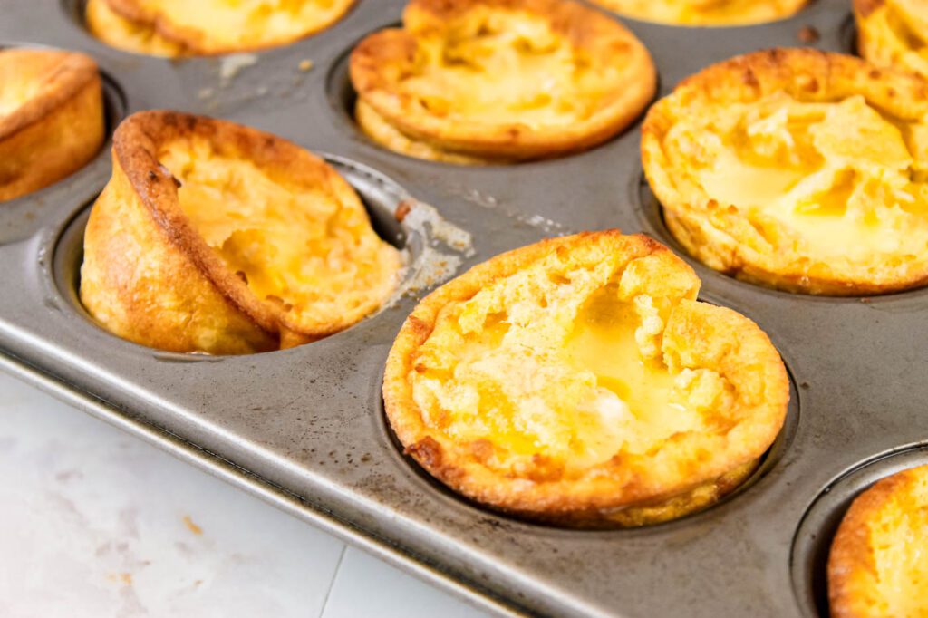 muffin pan filled with puff pancakes