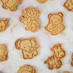 animal crackers from scratch scattered across the kitchen countertop