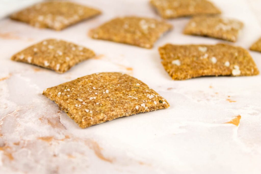 several crackers lay on a countertop