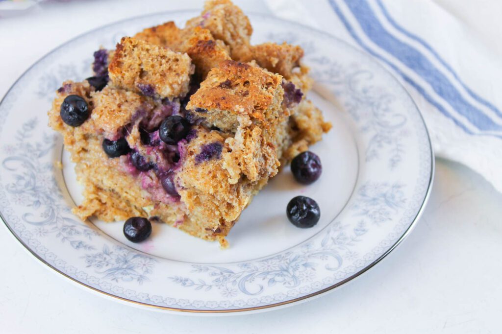 blueberry french toast sitting on a blue floral plate