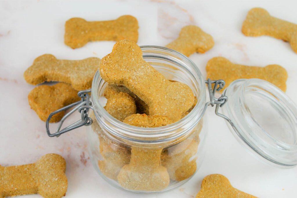glass canister filled with homemade dog treats
