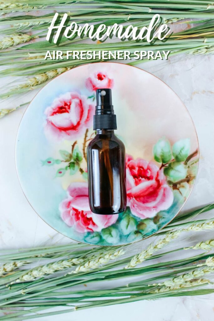 brown glass spray bottle on a floral plate