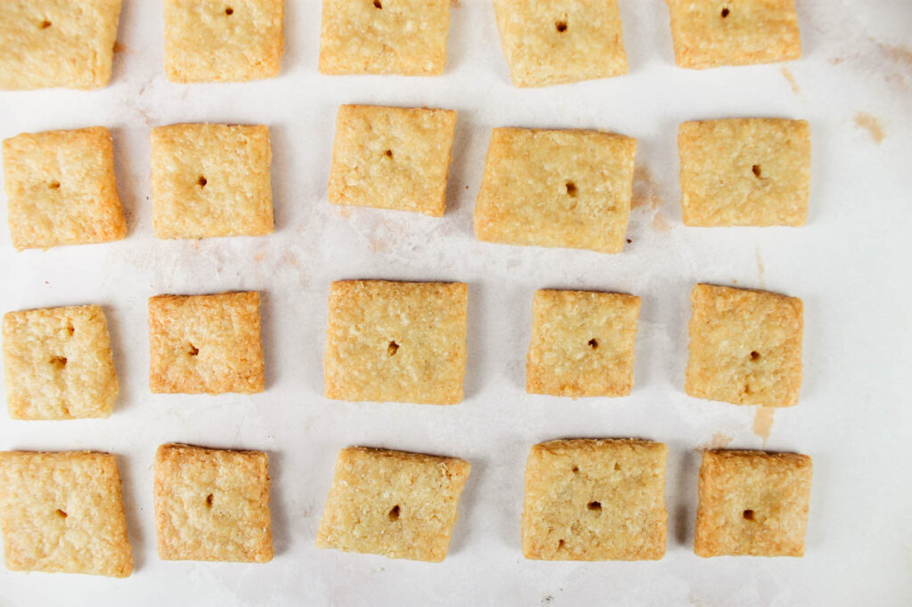 a surface filled with cheddar crackers
